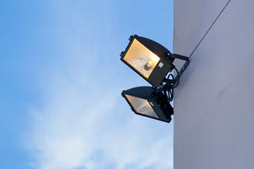2 lights mounted on a commercial building exterior