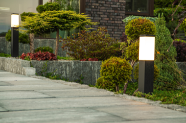 poles with light to illuminate the walkway to a commercial building